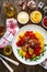 Linguine meatballs in bolognese sauce on wooden table