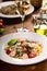 Linguine with shrimp, cherry tomatoes and capers