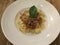 Linguini Bolognese with cheese . Top view