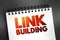 Link building - practice of building one-way hyperlinks to a website with the goal of improving search engine visibility, text