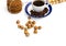 Linking of oatmeal cookies, cup of coffee, coffee grains and nut