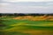 Links. Summer landscape overlooking the hills of the golf course.