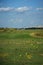 Links. Summer landscape overlooking the hills of the golf course.