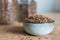 Linseed grain cereal in ceramic bowl