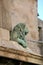 Lion at base of Egyptian obelisk, Arles, France.