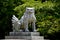 Lion guardian statue at Hokoku Shrine in Osaka Castle Park