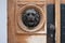 Lion head door knocker on wooden door