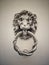 Lion head metal door knocker