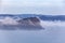 Lion Island under low clouds at Broken Bay.