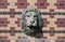 Lion mascaron on mosaic wall, Massandra Palace, Crimea