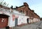 A lion over an arch leading to the courtyard of the merchants` house Morozov on the Socialist Avenue in Barnaul.