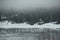 Lion`s Head harbour with melting ice and seagulls on the bay ref