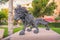 Lion Sculpture made with scrap tire in front of Cascade Complex