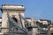 Lion statue chain bridge