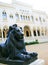 Lion statue in front of building