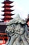 Lion statue guarding entrance to Miyajima Shrine