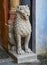 Lion statue near a passage door. Rocchetta Mattei. Italy