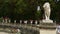 A Lion Statue and Potted Flowers at the Luxembourg Gardens