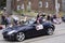 The Lions Club president greets viewers along Queen Street East Toronto in the Beaches Easter Parade 2017