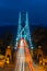Lions Gate bridge illuminated at night in Vancouver, British Columbia Canada