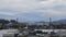 Lions Gate Bridge over Burrard Inlet with Boats at Harbour and Moving Clouds in Vancouver BC Canada Time Lapse