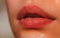 Lip balm. Lipcare lipstick. Close-up of sexy lips. Gloss makeup. Filler Injections, Plastic Surgery, Collagen and