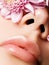 Lips augmentation. Perfect natural lip makeup. Close up macro photo with beautiful female mouth. Plump full lips. Close