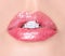 Lips with Diamond Ring. Beauty Pink Lip Gloss. Mouth