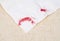 Lipstick mark on paper napkin