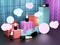 Lipstick showcase cube displays. Cosmetics exhibition space. Colorful showroom with open lipsticks. 3D illustration