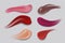 Lipstick smudge. Realistic make-up product. Lipsticks 3D strokes. Vector illustration