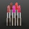 Lipsticks on dark background. Different colors