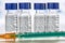 Liptovsky Hradok, Slovakia - April 20, 2020: Remdesivir instructions label on  medical bottles, injection syringe near. GS-5734 is