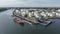 Liquid Cargo Transporter Ship Unloading Crude Oil to a Fuel Depot