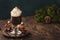 Liquid dark chocolate with whipped cream and cocoa powder. Winter and autumn time drink dessert. Christmas warm beverage. Copy