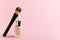 Liquid foundation cream unbranded bottle with makeup brush. Facial correction, liquid concealer, tone, bb, cc cream skincare