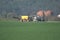 A liquid manure AKA slurry spreader being refilled