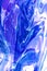 Liquid marbling blue paint texture. Fluid art. Grunge acrylic paint stains. Marbled blue brushstrokes and streaks