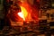 The liquid metal or cast iron poured into molds. Metal casting process with red high temperature fire in metallurgical factory.