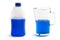 Liquid screenwash in plastic bottle and glass jug