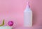 Liquid soap for women with a dispenser on a pink background. cleanser concept. Means for intimate hygiene. Gentle environmentally