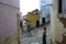 Lisbon, Alfama district. drying clothes hanging out to dry on washing line at a street corner on washday