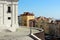 Lisbon church square surrounded by pastel houses