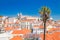 Lisbon city with red tile roofs and monastery Igreja Sao Vicente de Fora, Portugal