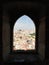 Lisbon City View Through Arched Window