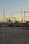 Lisbon harbour, Portugal. Cranes at sunset