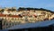 Lisbon houses roof windows hill castle trees sky