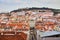 Lisbon Portugal - Beautiful panoramic view of the red roofs of houses in antique historical district Alfama and the Tagus River