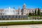 Lisbon, Portugal. Jeronimos Monastery or Abbey aka Santa Maria de Belem seen from Jardim da Praca do Imperio Garden