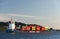 LISBON, PORTUGAL - JULY, 06, 2018: Cargo ship floating on the river Tagus in Lisbon, Portugal.